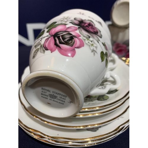 223 - FLORAL PORCELAIN CUPS & SAUCERS