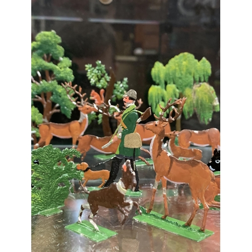 66 - TIN PAINTED HUNTING FIGURES