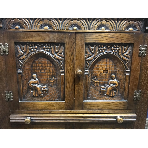 72 - HEAVELY CARVED CUPBOARD