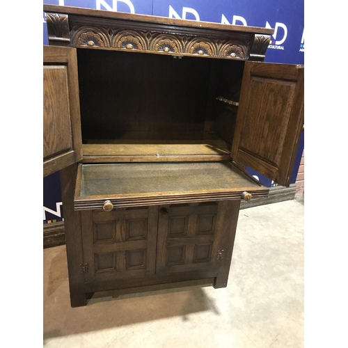 72 - HEAVELY CARVED CUPBOARD