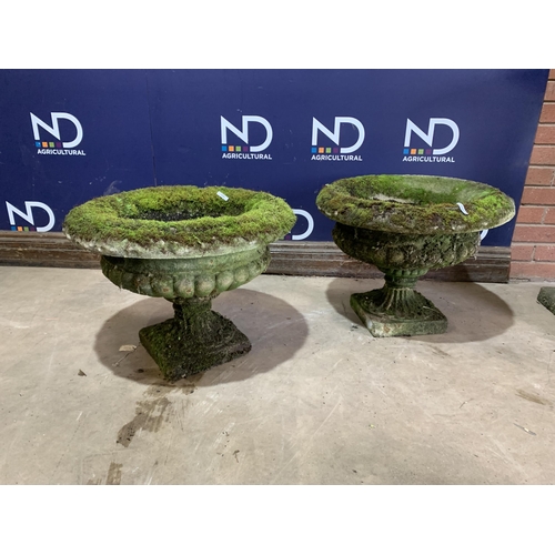 13 - PAIR OF COMPOSITE STONE URNS