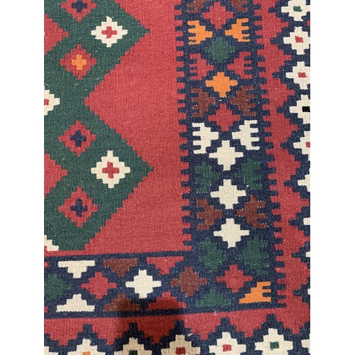 163 - LARGE ORNATE RUG