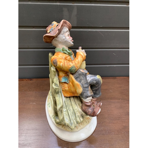 202 - CAPODIMONTE TRAMP ON A BENCH