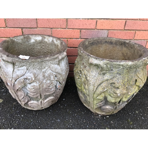 17 - PAIR OF COMPOSITE STONE URNS