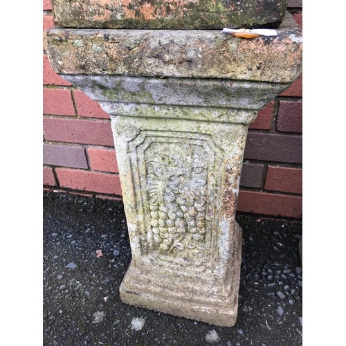 21 - PAIR OF TERRACOTTA STONE LIONS ON PLINTHS