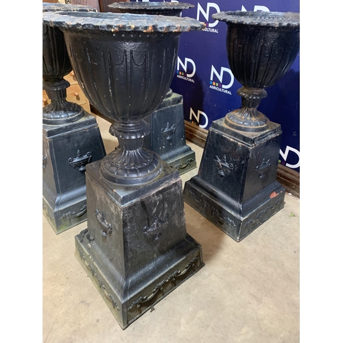 72 - 4 LARGE CAST IRON GARDEN URNS