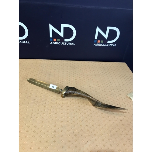 102 - BRASS PAGE TURNER GOAT HORN HANDLE 
BELIEVED TO BE ASSOCIATED WITH  THE ROYAL FUSILIERS MASCOT