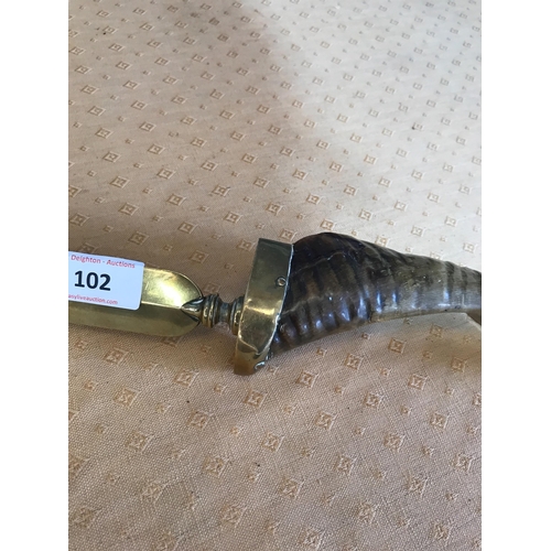 102 - BRASS PAGE TURNER GOAT HORN HANDLE 
BELIEVED TO BE ASSOCIATED WITH  THE ROYAL FUSILIERS MASCOT