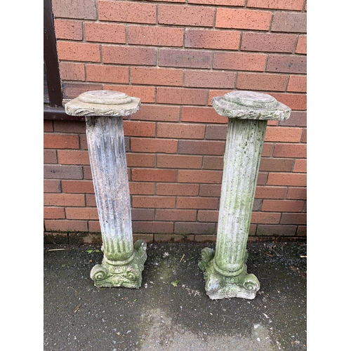 74 - PAIR OF COMPOSITE STONE PEDESTALS