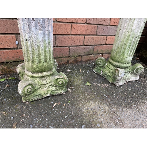 74 - PAIR OF COMPOSITE STONE PEDESTALS