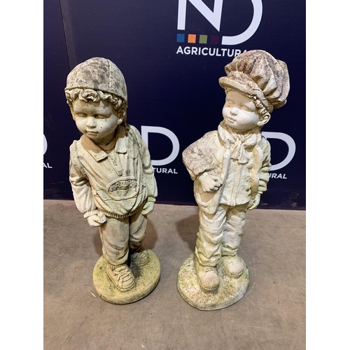 75 - PAIR OF COMPOSITE BOYS