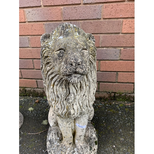 76 - PAIR OF COMPOSITE STONE LIONS