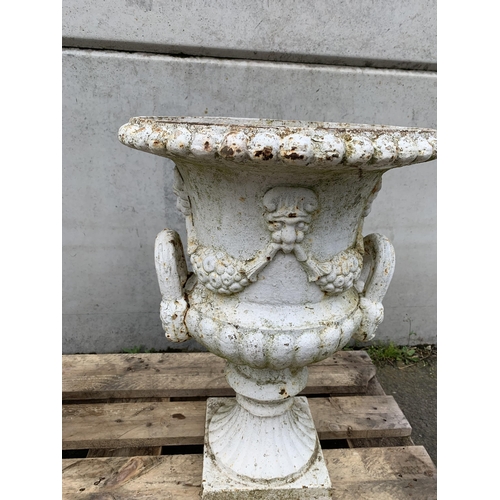 77 - PAIR OF CAST IRON URNS