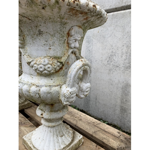 77 - PAIR OF CAST IRON URNS