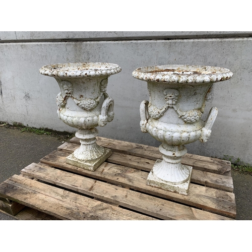 77 - PAIR OF CAST IRON URNS
