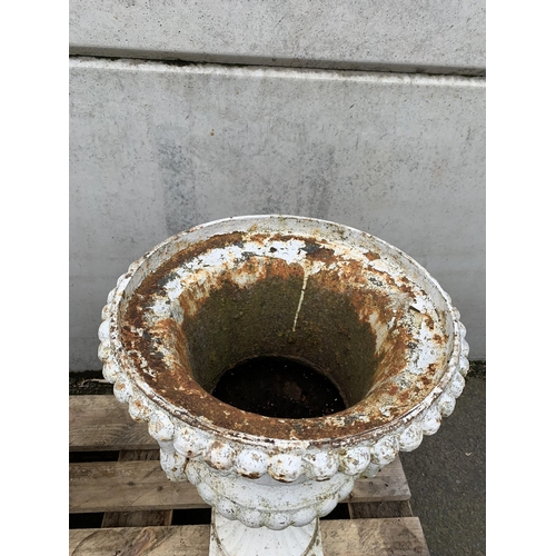 77 - PAIR OF CAST IRON URNS