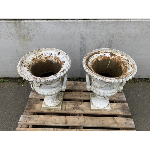 77 - PAIR OF CAST IRON URNS