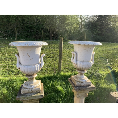 36 - PAIR OF CAST URNS