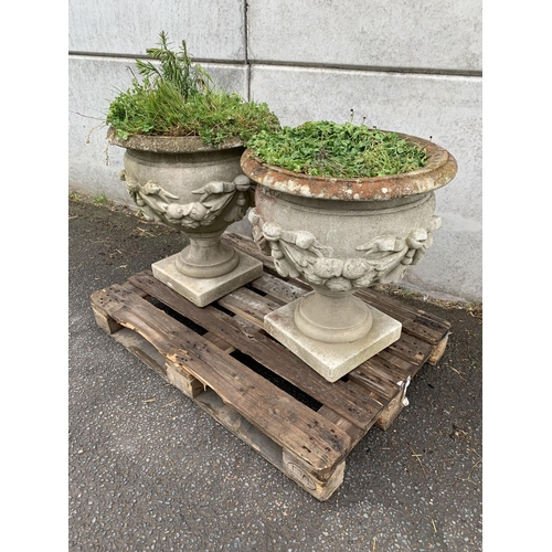 9 - PAIR OF HADLE STONE URNS