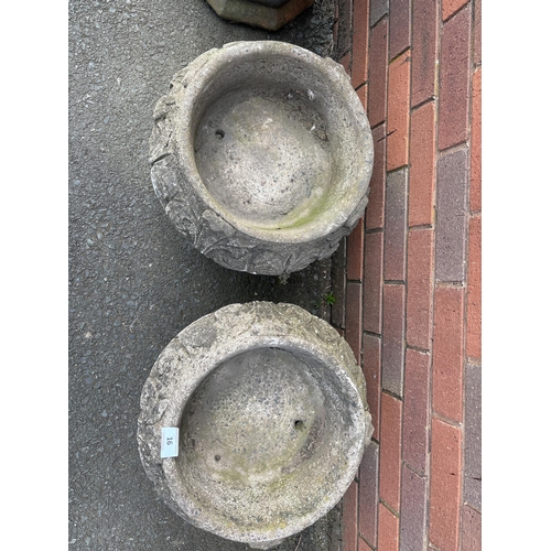 16 - PAIR OF COMPOSITE STONE URNS