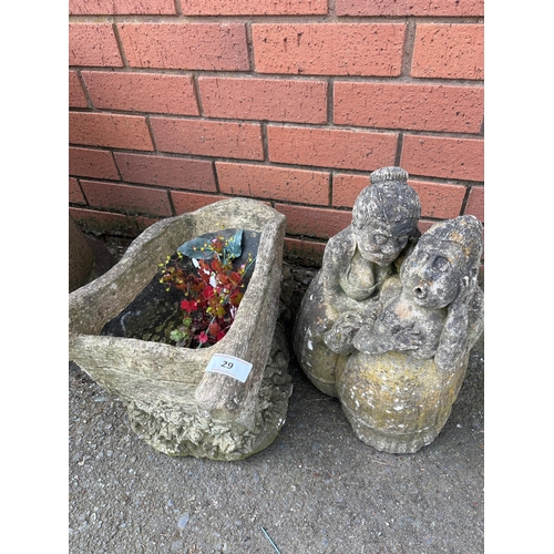 29 - PAIR OF COMPOSITE STONE GARDEN FIGURES