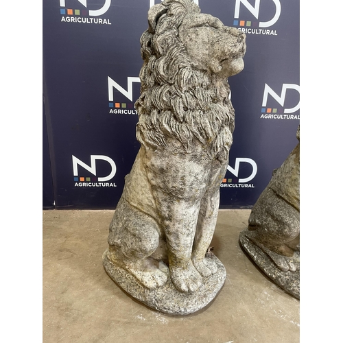 53 - PAIR OF COMPOSITE STONE LIONS