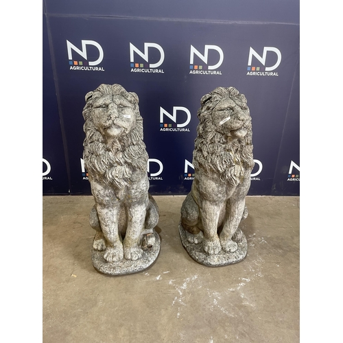 53 - PAIR OF COMPOSITE STONE LIONS