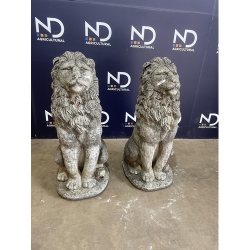 53 - PAIR OF COMPOSITE STONE LIONS