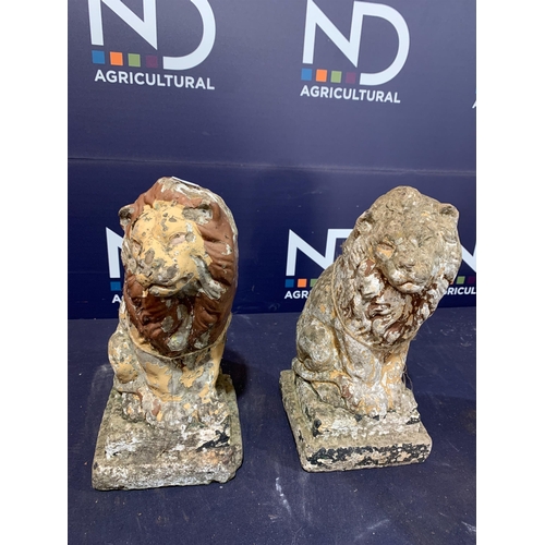 61 - PAIR OF COMPOSITE STONE LIONS