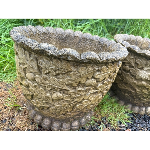 43 - PAIR OF COMPOSITE STONE PLANTERS