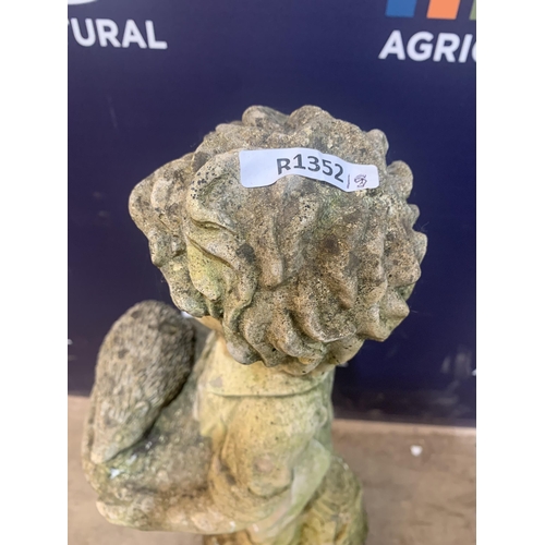 66 - COMPOSITE STONE FIGURE