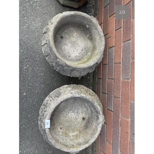 51 - PAIR OF COMPOSITE STONE URNS