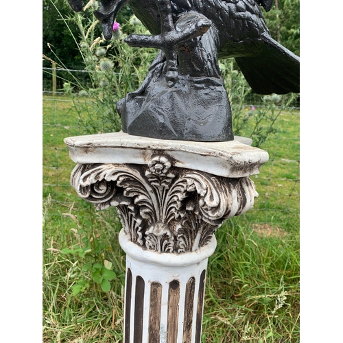 111 - PAIR OF CAST EAGLES ON PEDESTALS