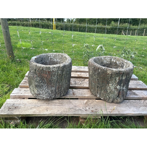 68 - PAIR OF COMPOSITE STONE PLANTERS