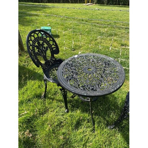 74 - CAST TABLE & CHAIRS