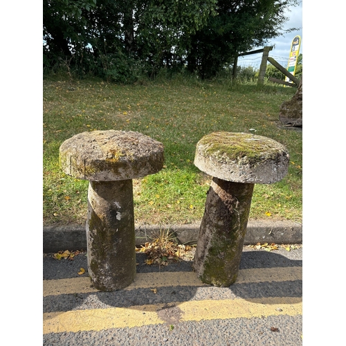 78 - PAIR OF COMPOSITE STONE STADDLE STONES