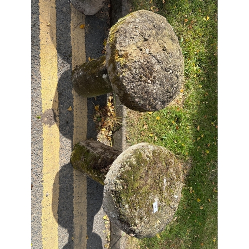 78 - PAIR OF COMPOSITE STONE STADDLE STONES