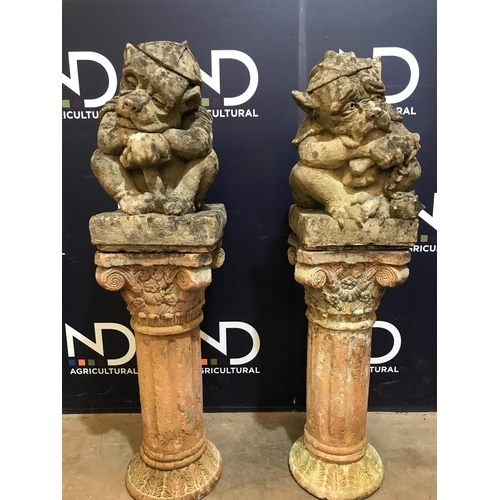 8 - PAIR OF TERRACOTTA PLINTHS & GOBLINS