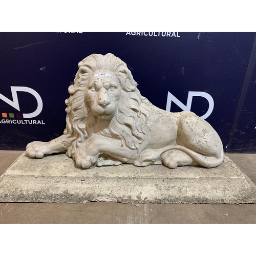 9 - COMPOSITE STONE LION ON PLINTH