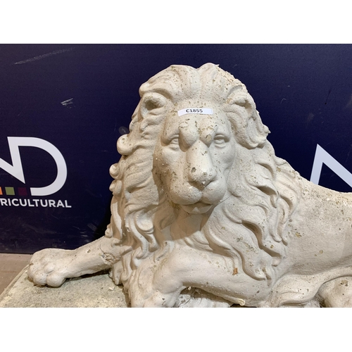 9 - COMPOSITE STONE LION ON PLINTH