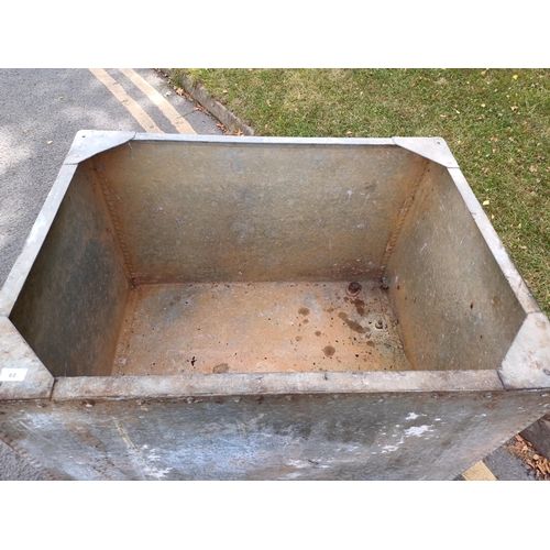 64 - LARGE RIVETED GALVANISED TROUGH