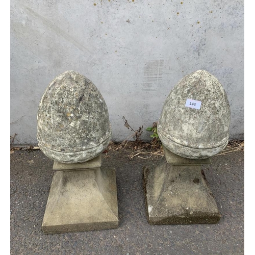 68 - PAIR OF COMPOSITE STONE FINIALS