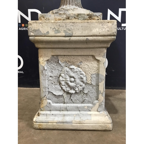 10 - CAST IRON URN ON PLINTH