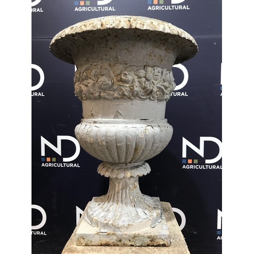 10 - CAST IRON URN ON PLINTH