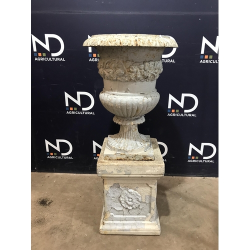 10 - CAST IRON URN ON PLINTH