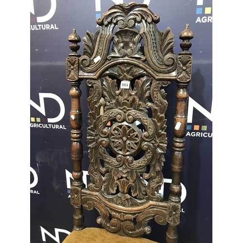 166 - HEAVILY CARVED CHAIR