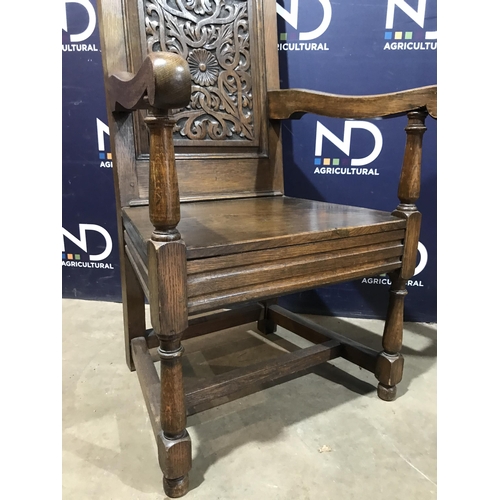 167 - HEAVILY CARVED OAK CHAIR