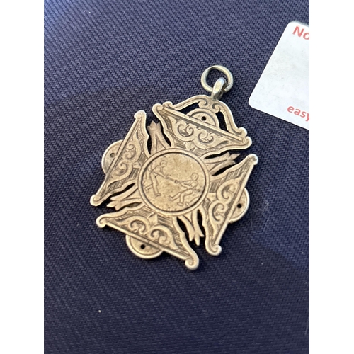 78 - SILVER TUG OF WAR BADGE