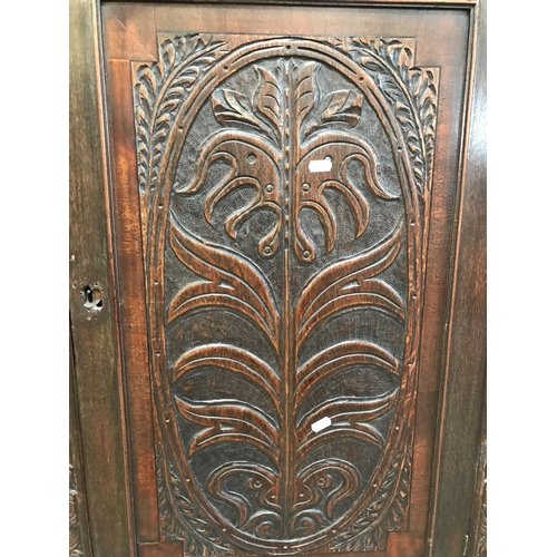 780 - HEAVILY CARVED CORNER CUPBOARD