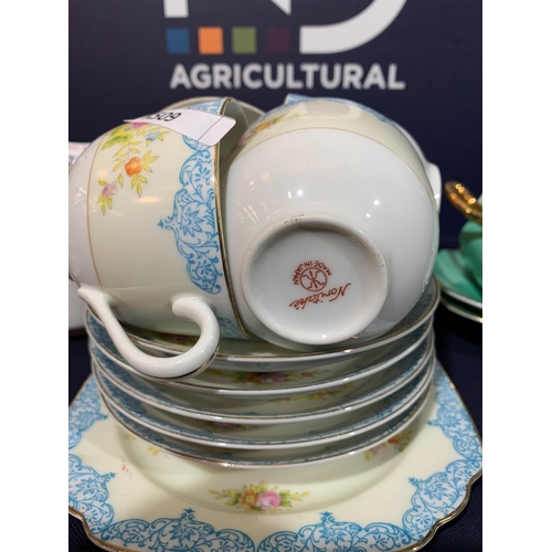 473 - TEA CUPS & SAUCERS